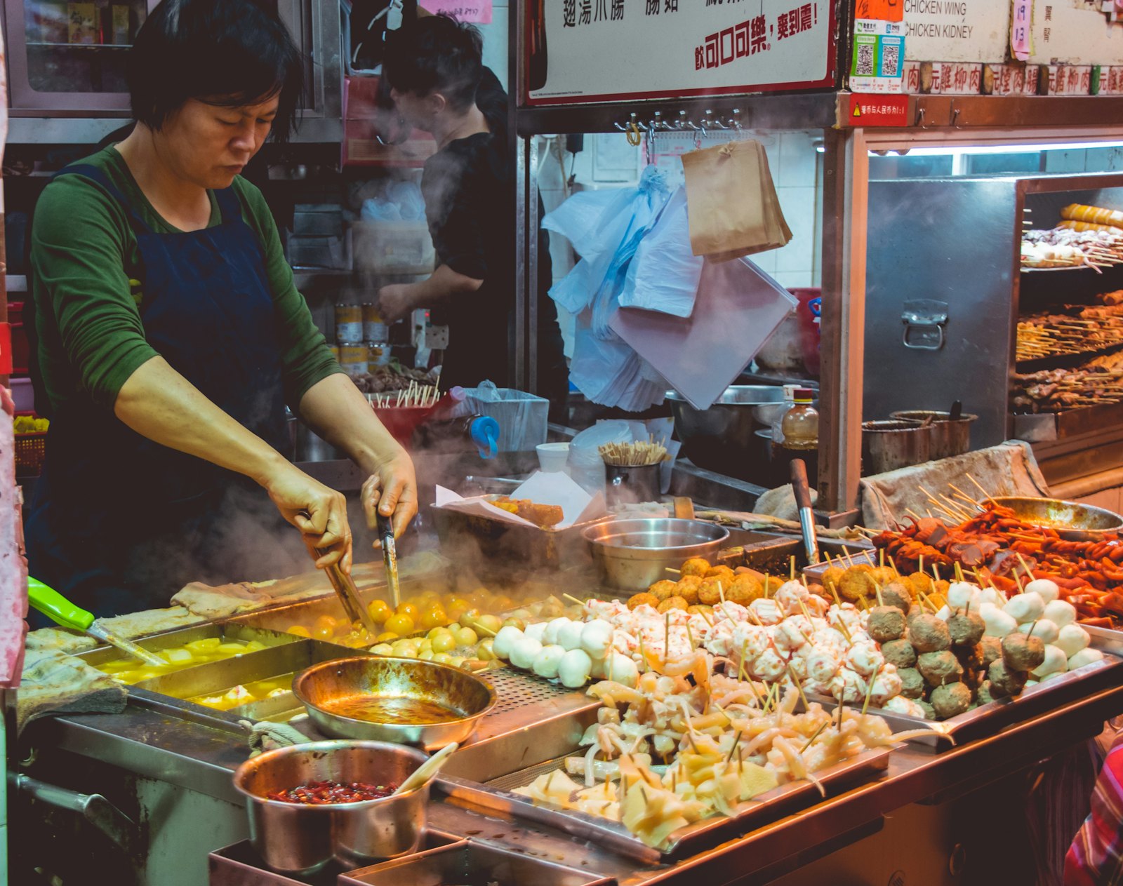 Woman cooking street foods