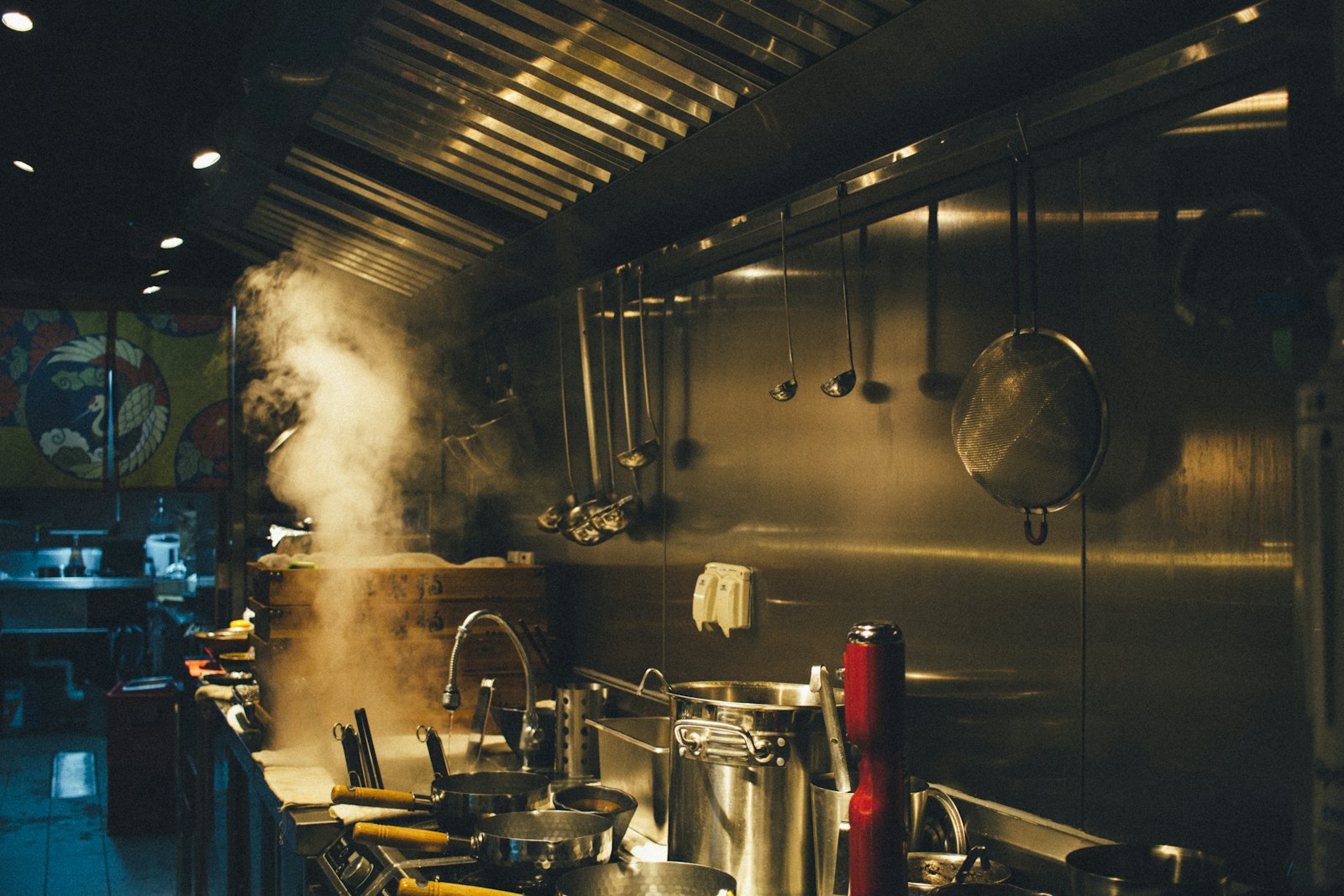 Stainless steel cooking pots on stove
